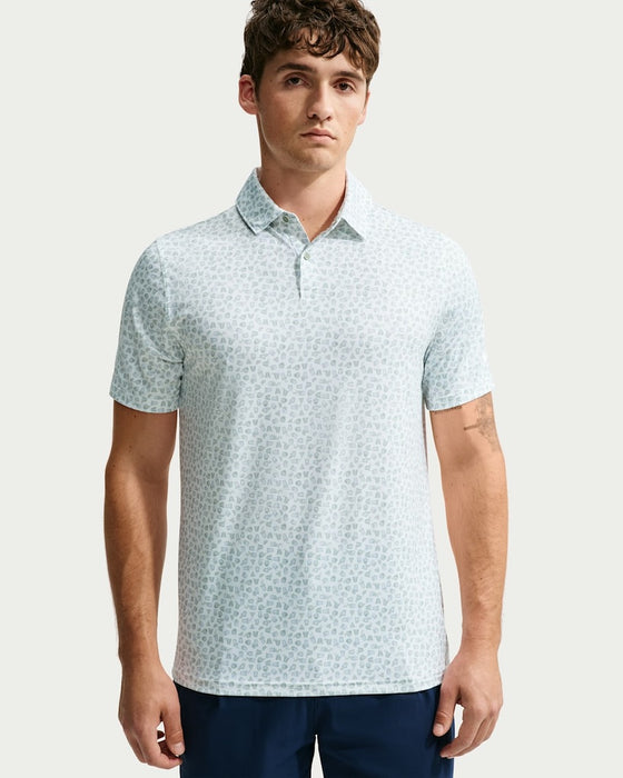 white and green Nike Dri-FIT Micro-Print Golf Polo Shirt on male model 