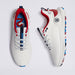 A pair of white G/FORE MG4+ O2 Perforated Men's Spikeless Golf Shoes shown from top and side views on a light grey background, featuring red and blue accents, white laces, and a circular logo on the heel.
