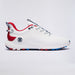A white G/FORE MG4+ O2 Perforated Men's Spikeless Golf Shoes with red and blue accents, featuring a textured white upper, white midsole, red heel tab, and a black circular logo on the side, set against a light grey background.