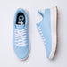 A pair of light blue G/FORE G.112 Perforated Men's Spikeless Golf Shoes shown from top and side angles on a clean white background. The shoes feature white laces, white midsoles, and brown outsoles, with the brand name G.112 visible on the inner sole.