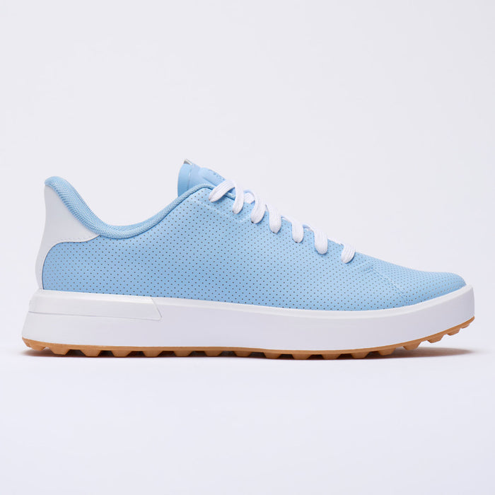 A light blue G/FORE G.112 Perforated Men's Spikeless Golf Shoes with white laces, a thick white midsole, and a gum brown outsole, shown in a side profile on a white background.