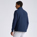 male model wearing a G/FORE The Maverick Hybrid Stretch 2.0 Men's Golf Gilet showing of the back in navy