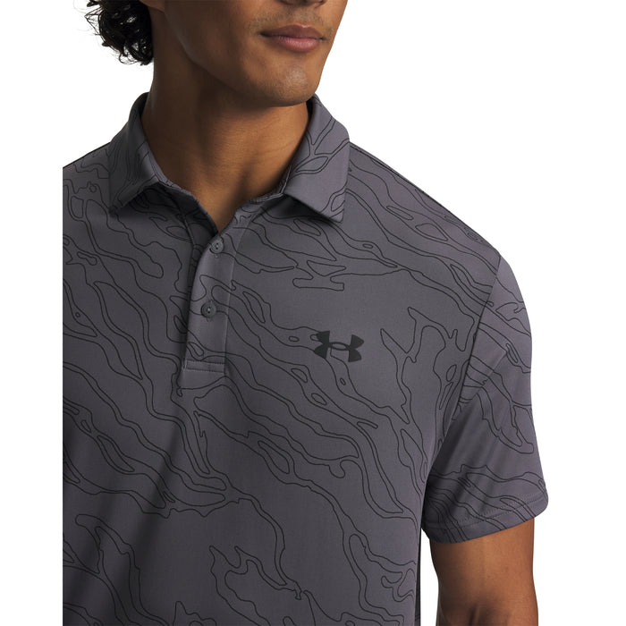 Under Armour Playoff 3.0 Printed Polo Golf Shirt in grey with black contour pattern. On a model, close up of chest UA logo