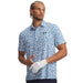 Under Armour Playoff 3.0 Printed Polo Golf Shirt in white with blue floral pattern on model