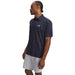 Under Armour Playoff 3.0 Printed Polo Golf Shirt in navy with grey pattern on model facing to the side