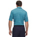 Man wearing a blue under armour golf striped polo shirt on a white background