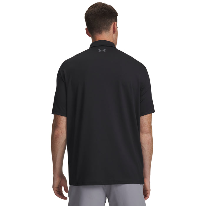 Man wearing a black Under Armour polo shirt on a white background