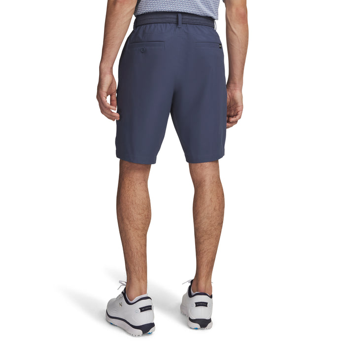 A model wearing Under Armour Drive Golf Shorts  in downpour grey facing away, showing the buttons on the back pockets
