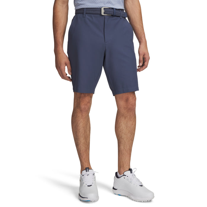 A model wearing Under Armour Drive Golf Shorts in downpour grey and a navy belt front facing