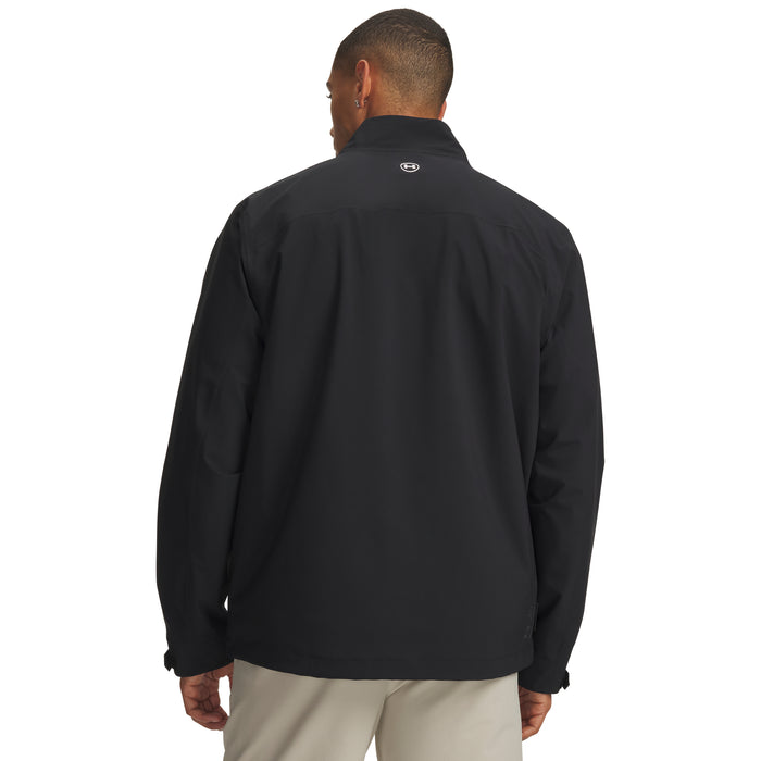 Back view of a black Under Armour Drive Pro waterproof golf jacket with a small logo on the collar.