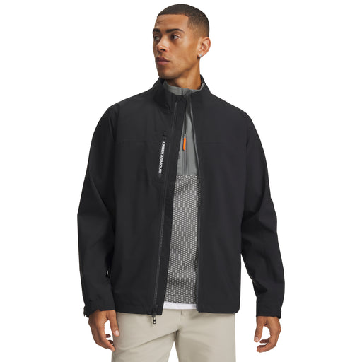 Under Armour Drive Pro waterproof golf jacket in black, featuring a front zip design and high collar, front view.