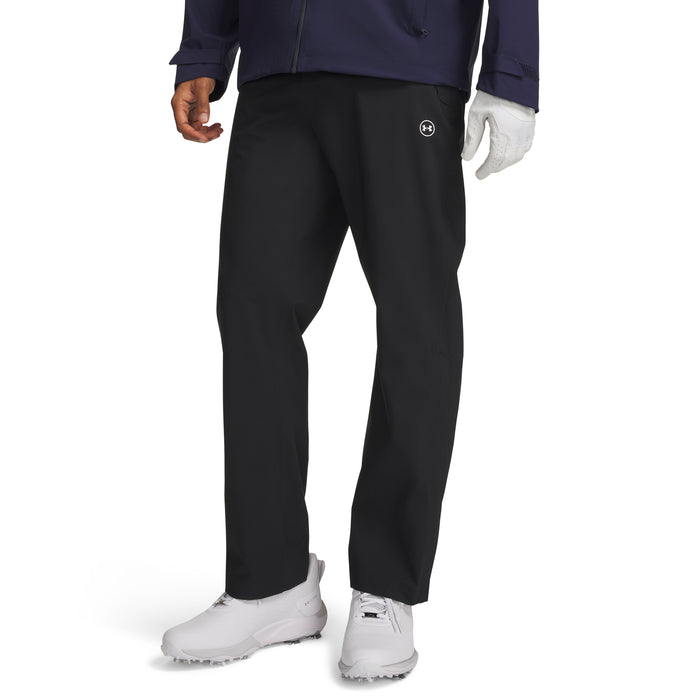 Under Armour Drive Pro waterproof golf trousers in black, front view featuring a small logo on the hip.