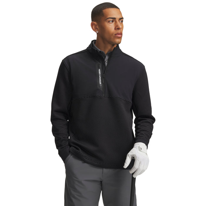 Under Armour Drive Pro Hybrid black and white half-zip golf midlayer, front view on a male model.