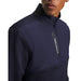 Under Armour Drive Pro Hybrid navy half-zip golf midlayer with textured sleeves and branded chest zip pocket.