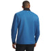 Back view of blue Under Armour Drive Pro Hybrid golf midlayer with a textured pattern and black collar.