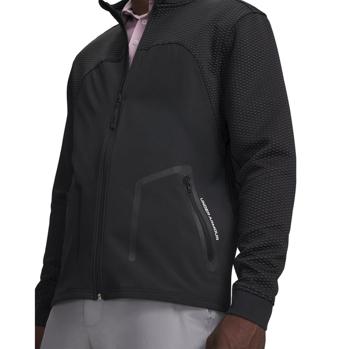 Under Armour Drive Pro Hybrid black full-zip golf jacket with textured shoulder panels and zipped side pocket.