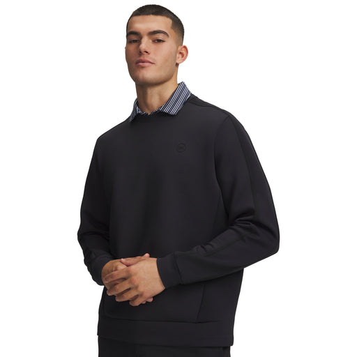 Under Armour Drive men's black crew neck golf midlayer with a white and black striped collar, front view.