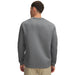 Back view of a grey Under Armour Drive men's crew neck golf midlayer with textured fabric and dark sleeve detailing.