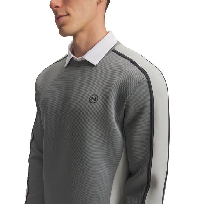 Under Armour Drive men's grey crew neck golf midlayer, side view showing textured fabric and white collar detail.