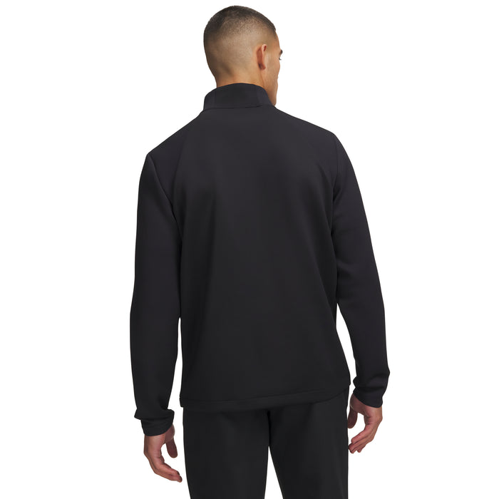 Back view of a black Under Armour Drive men's quarter zip golf midlayer with textured sleeves.