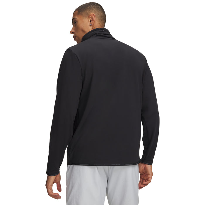 Back view of a black Under Armour Drive men's funnel neck golf midlayer with long sleeves and a branded hem.