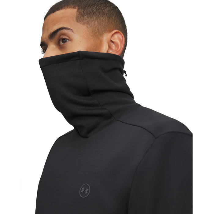 Under Armour Drive men's black funnel neck golf midlayer, side view showing integrated face covering and chest logo.