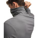 Grey Under Armour Drive men's funnel neck golf midlayer, back view showing the adjustable collar toggle detail.