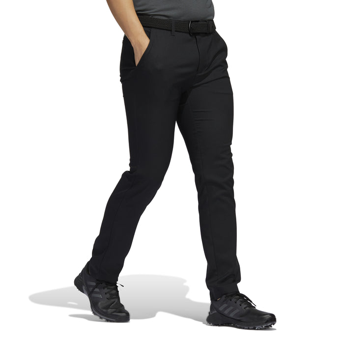 black Adidas golf trousers
